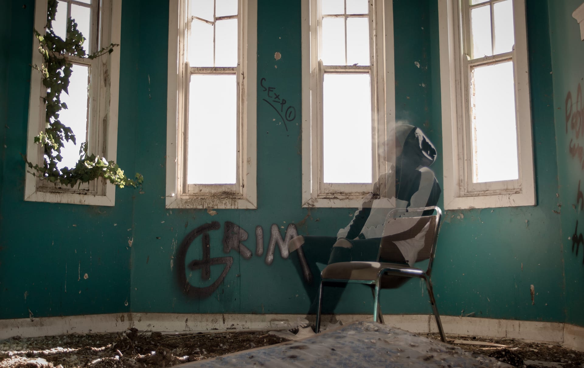 Ghost sitting on chair in empty room. Photograph by kind permission of Corey McAloon. Instagram: coreymcaloon